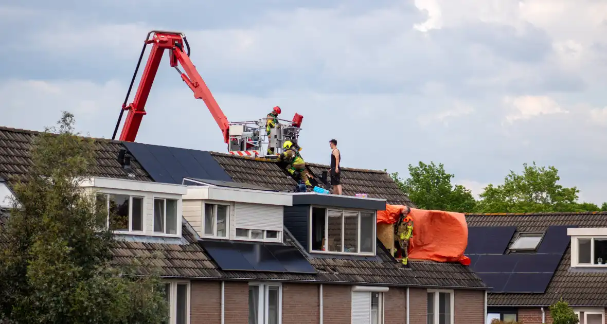 Brand op dak van woning door werkzaamheden - Foto 1