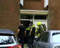 Brandweer blust brand in flat