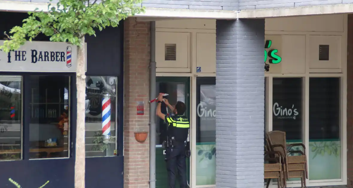 Politie doet onderzoek naar schietpartij bij restaurant - Foto 4