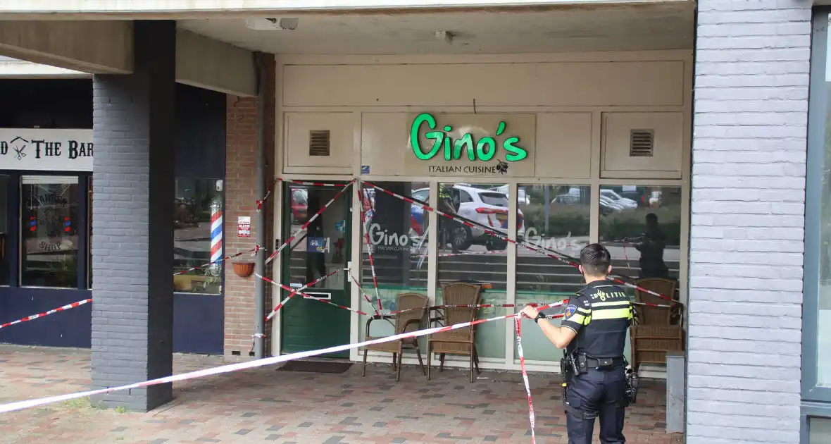 Politie doet onderzoek naar schietpartij bij restaurant - Foto 6