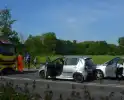 Schade bij ongeval tussen drie voertuigen