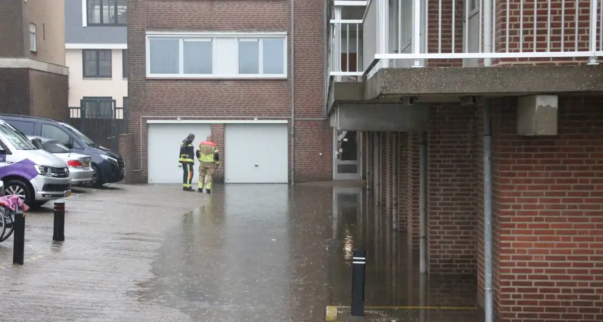 Wederom wateroverlast bij flatgebouw - Foto 6