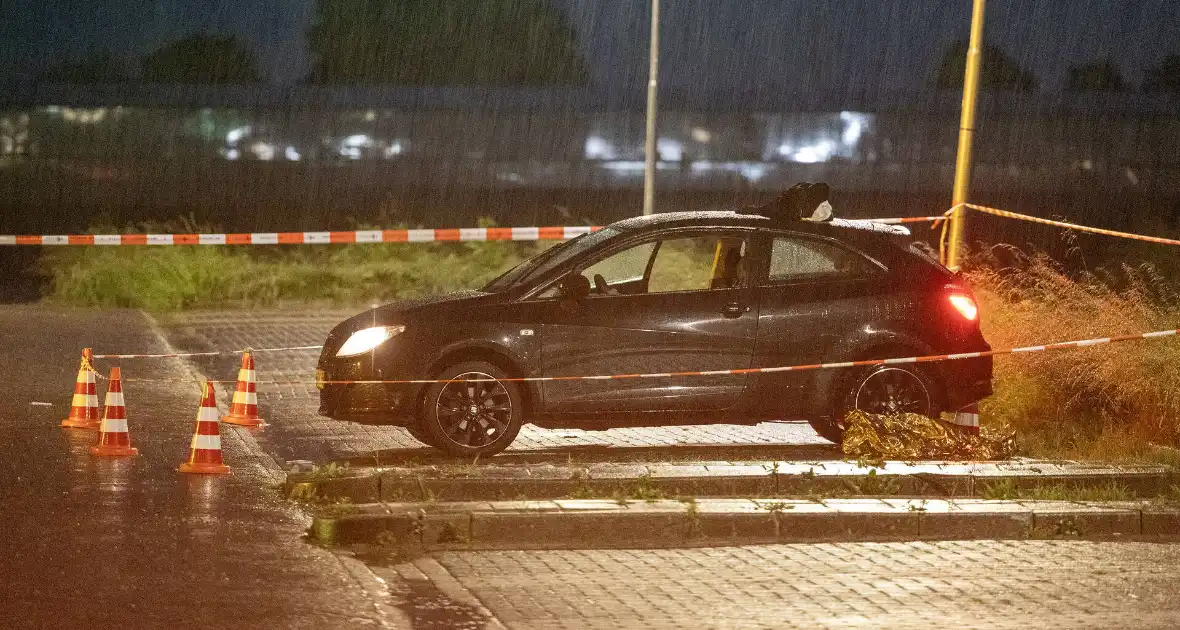 Gewonde bij schietpartij op parkeerplaats - Foto 1