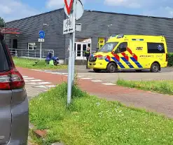 Schade na aanrijding tussen auto en scooter