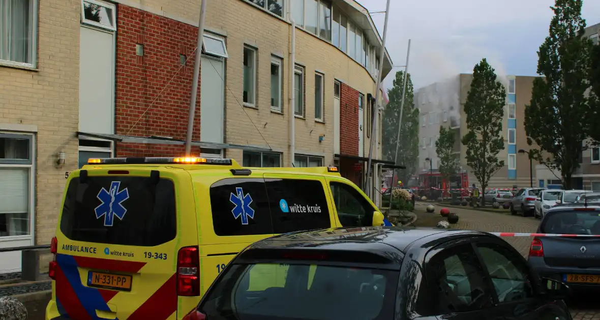 Personen gered bij gasbrand in portiekflat - Foto 2