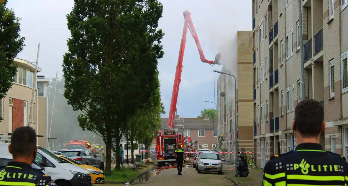 Personen gered bij gasbrand in portiekflat - Foto 3