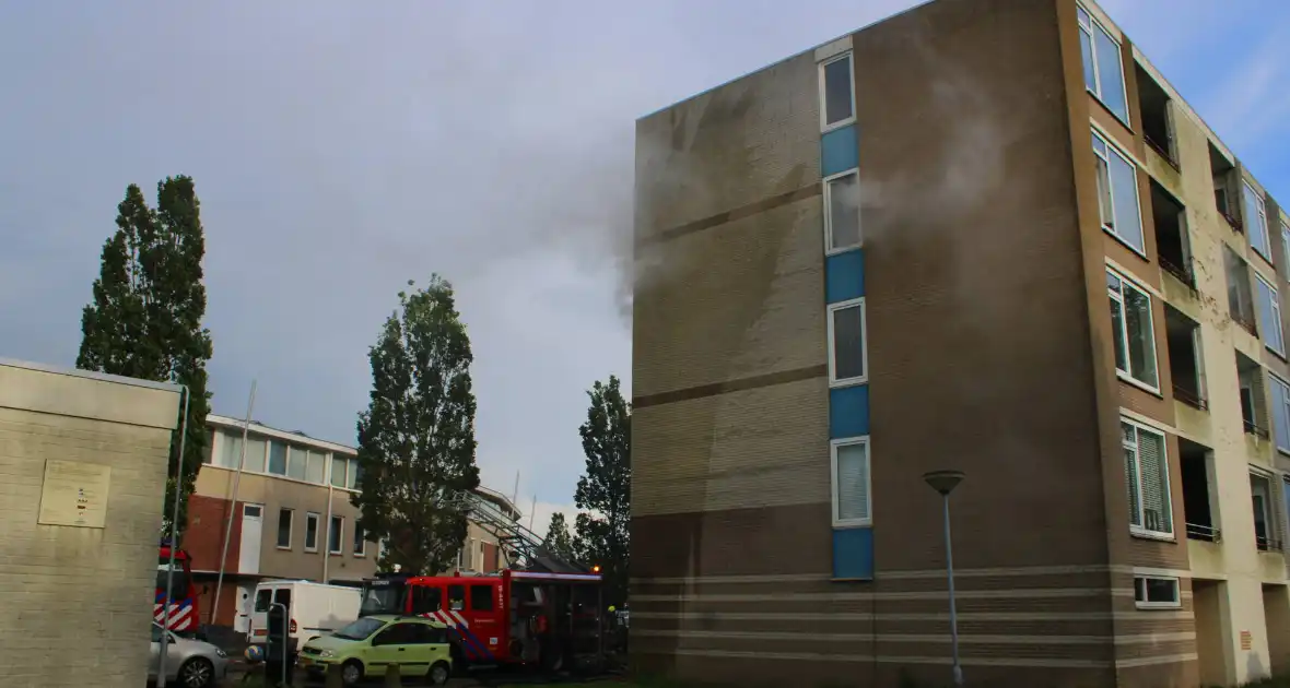 Personen gered bij gasbrand in portiekflat - Foto 8