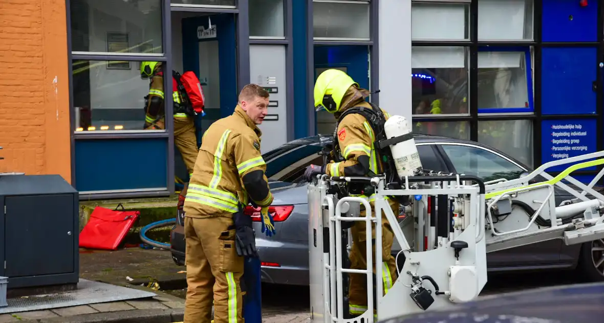 Persoon gered bij uitslaande brand - Foto 1