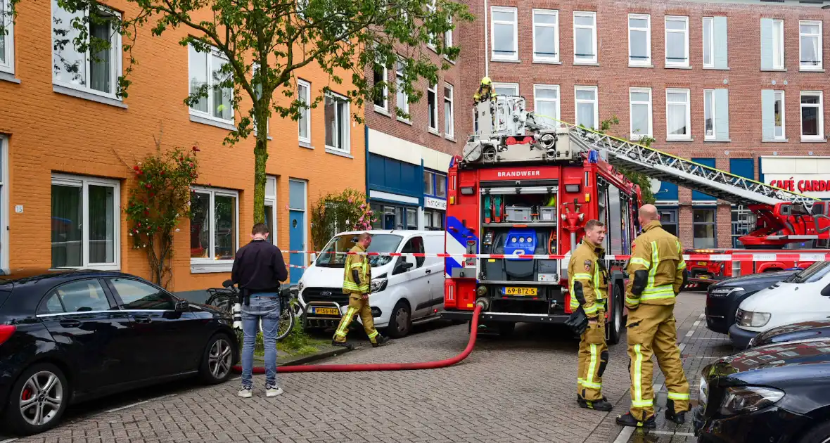 Persoon gered bij uitslaande brand - Foto 3