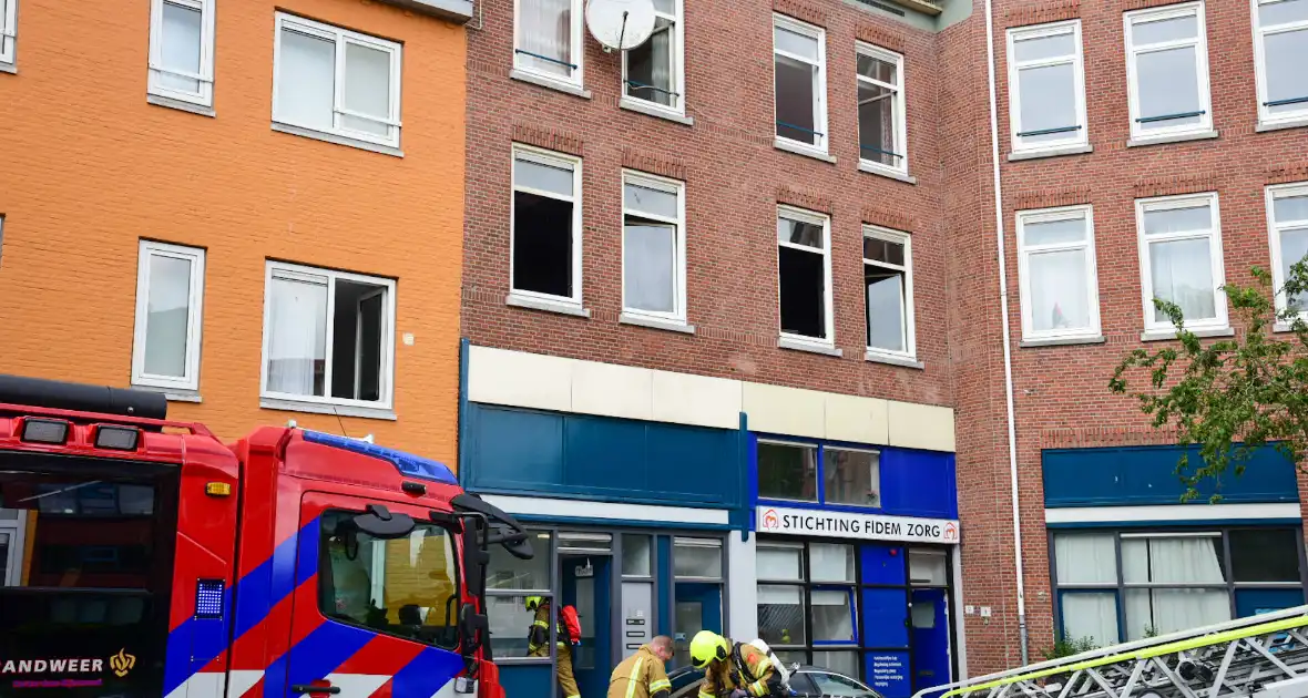 Persoon gered bij uitslaande brand - Foto 4