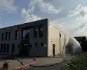Brand in bedrijfspand brandweer groots ingezet
