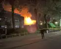 Grote uitslaande brand in pand
