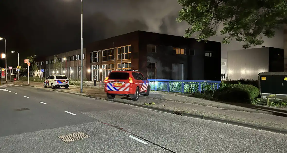 Grote uitslaande brand in pand - Foto 5