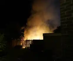 Uitslaande brand in bijgebouw