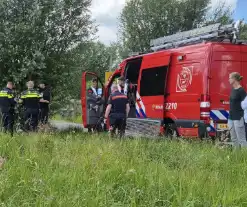 Brandweer duikers zoeken persoon