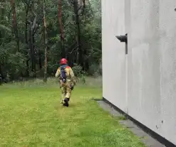 Brandweer aanwezig voor mogelijke brand flatgebouw