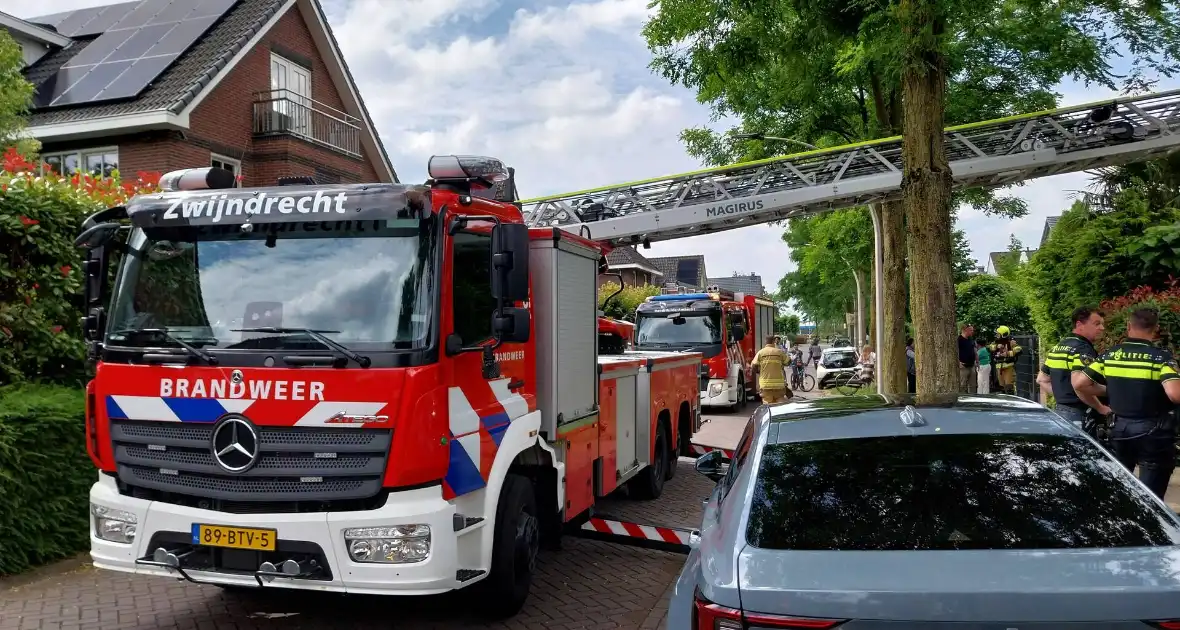 Brand op dak van garage - Foto 4