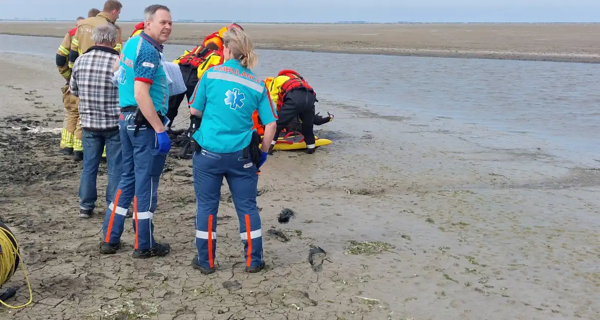 Brandweer redt persoon uit drijfzand - Foto 6