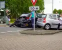 Motorrijder klemgereden tussen twee auto's