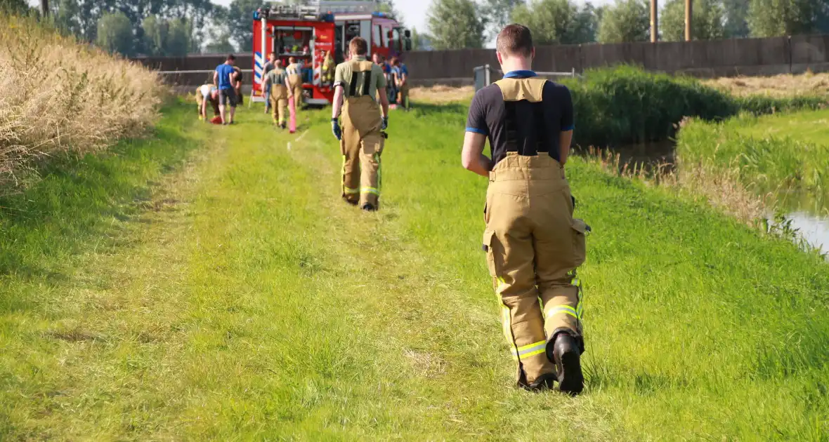 Middelbrand na bermbrand langs spoor