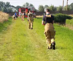 Middelbrand na bermbrand langs spoor