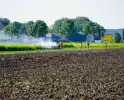 Grote rookwolken door brand in tractor