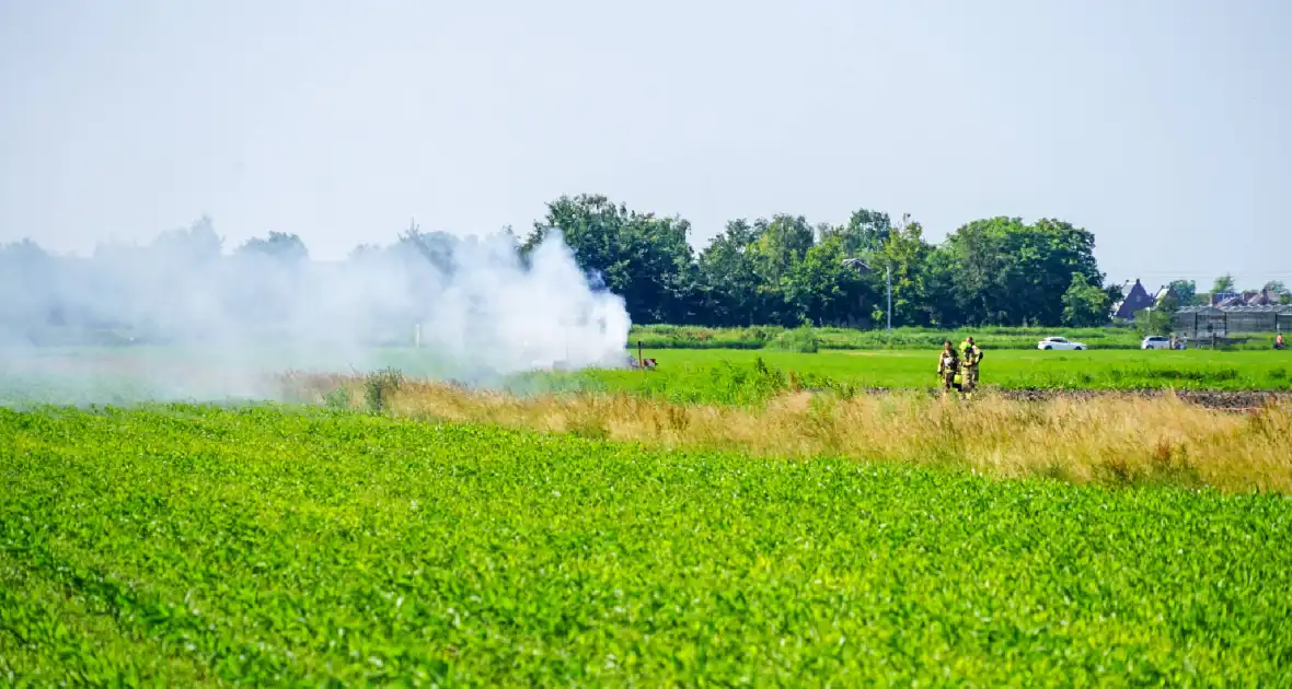 Grote rookwolken door brand in tractor - Foto 8