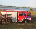 Brandweerwagen rijdt zich vast in berm