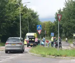 Fietser geschept door automobilist op oversteekplaats