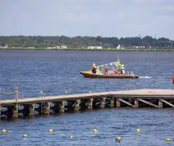 Drie jonge surfers gered op het Gooimeer