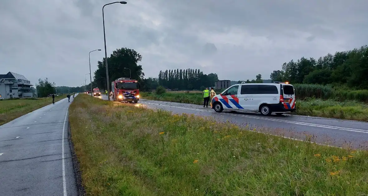 Personenauto belandt in water - Foto 7