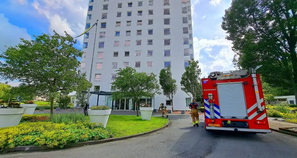 Brandweer blust kleine brand in woning - Foto 1