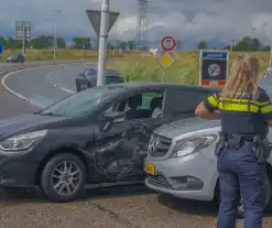 Aanhouding bij frontale botsing op rotonde