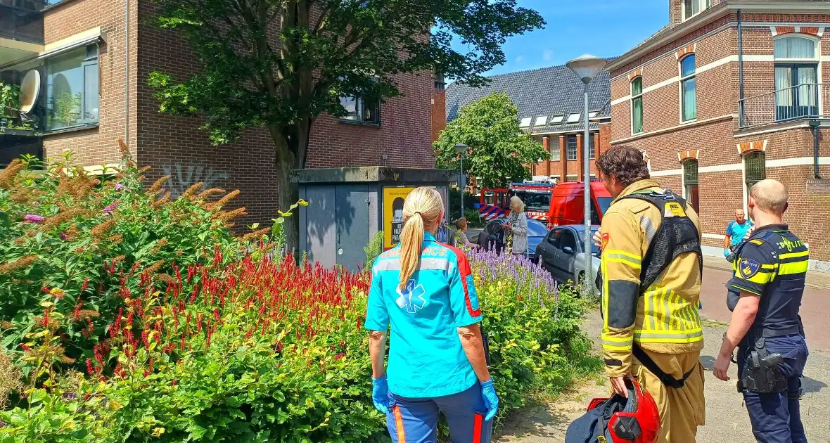 Voorbijganger onder brand in flat - Foto 3