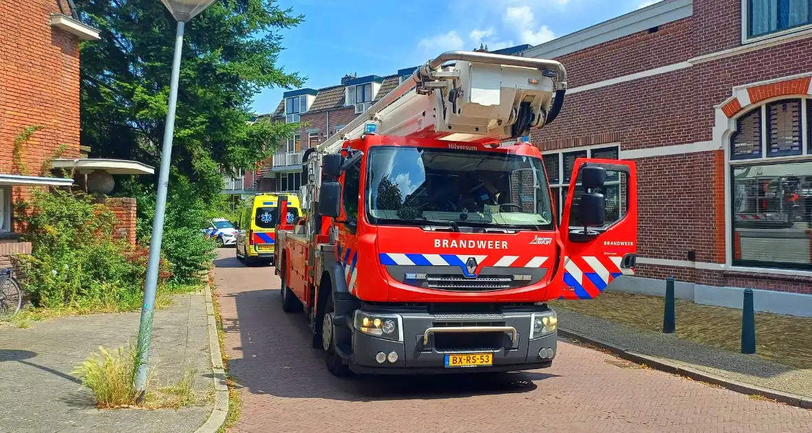 Voorbijganger onder brand in flat - Foto 4