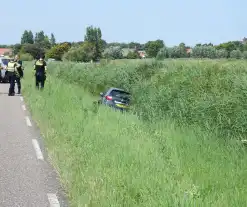 Automobiliste raakt te water