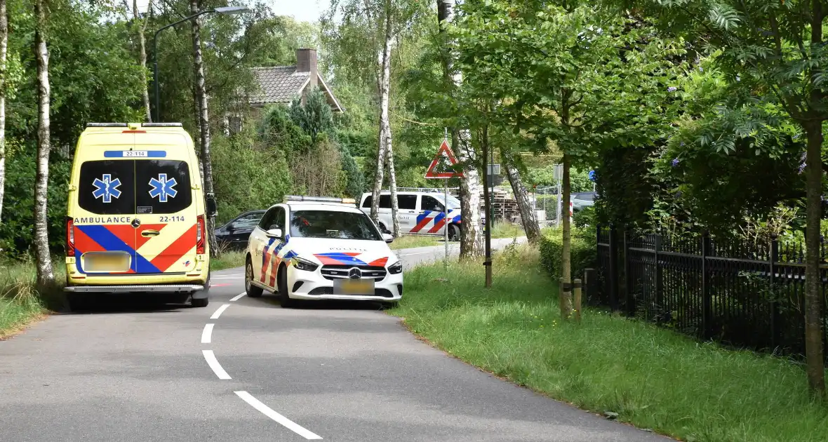 Gewond Persoon naast mountainbike aangetroffen op wegdek - Foto 1