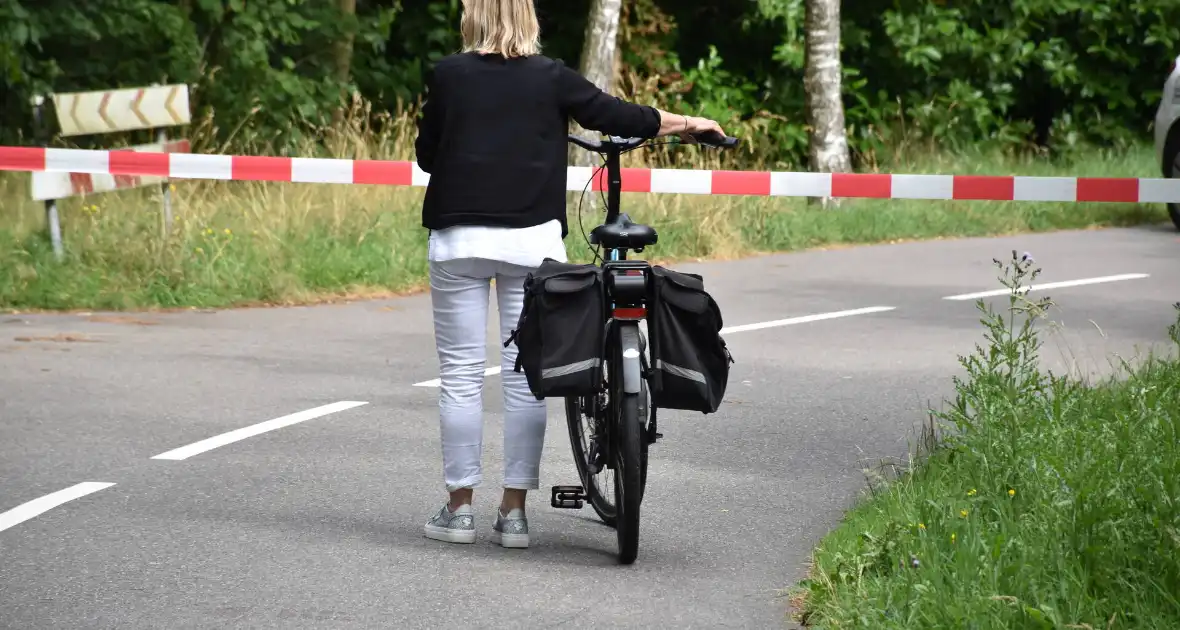 Gewond Persoon naast mountainbike aangetroffen op wegdek - Foto 3