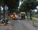 Motorrijder en scooterrijder botsen op elkaar