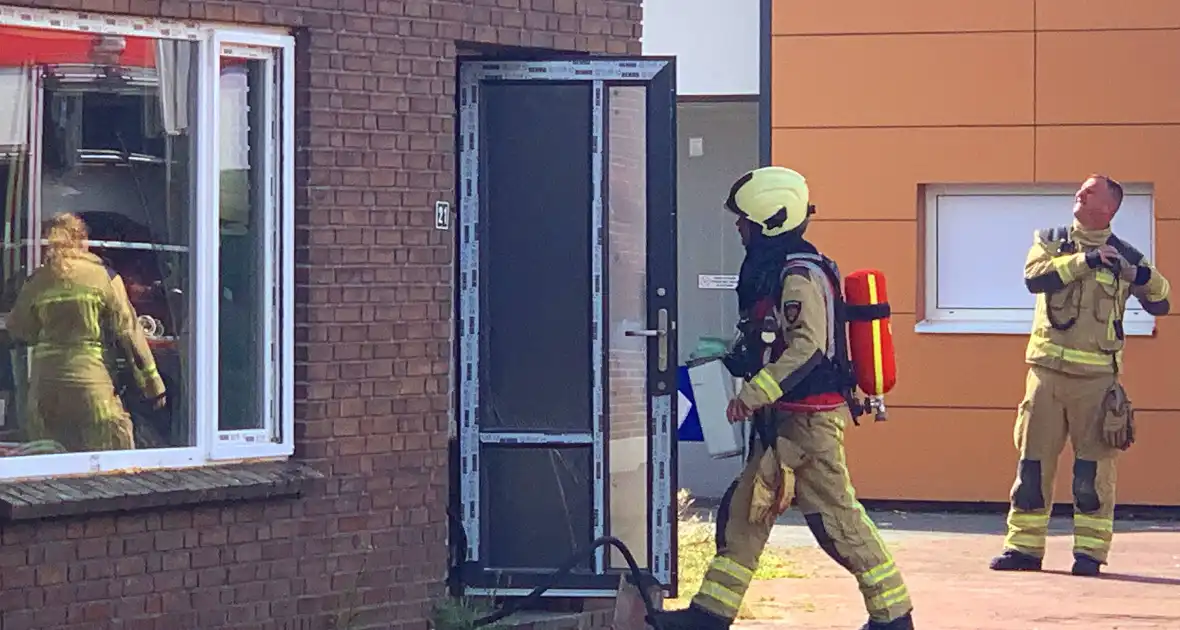 Straat afgezet vanwege brand in woning - Foto 2