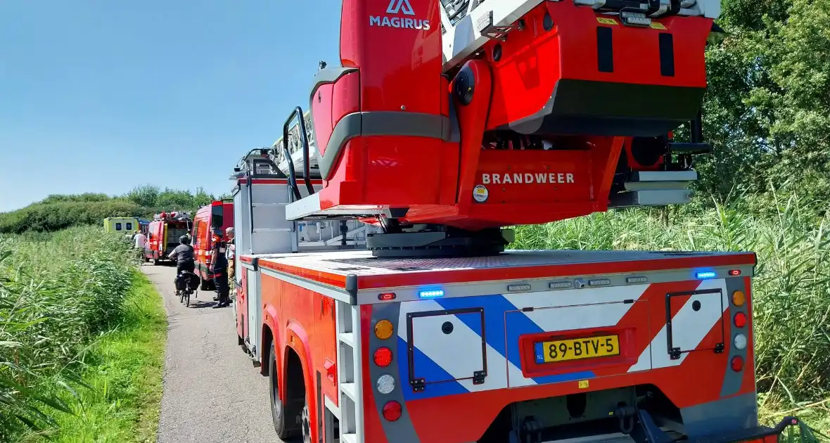 Persoon op scootmobiel belandt in water - Foto 3