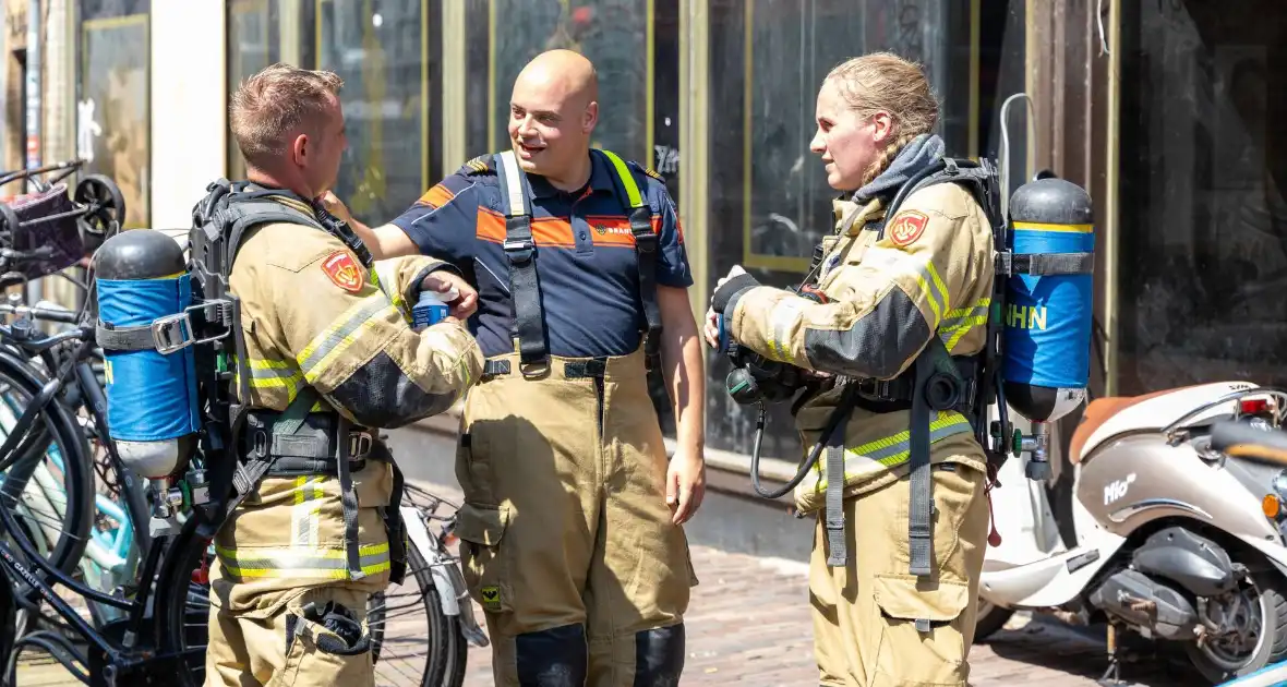 Brandende bouwmaterialen in binnenstad - Foto 4