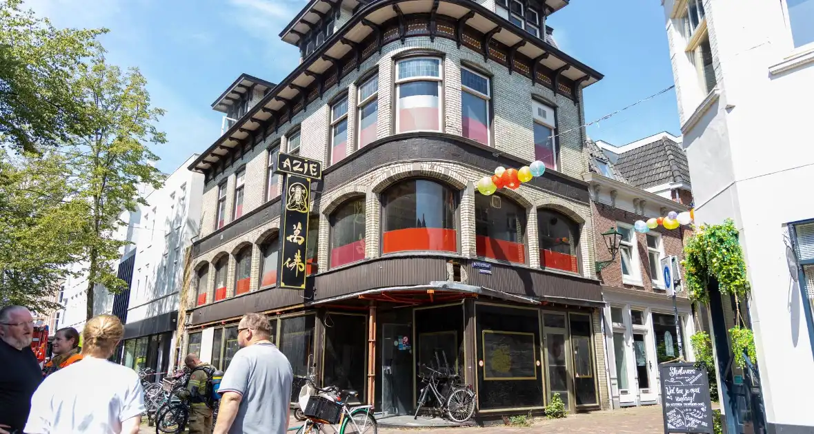 Brandende bouwmaterialen in binnenstad - Foto 8