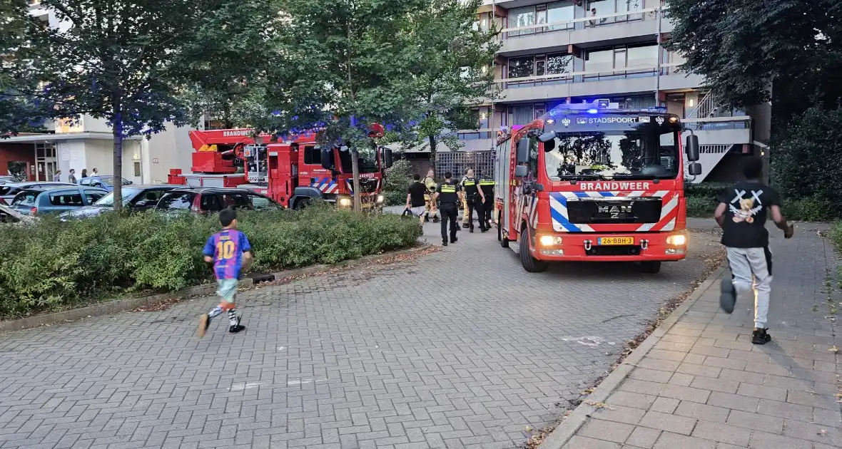 Brandweer ingezet voor brandmelding in flat - Foto 1