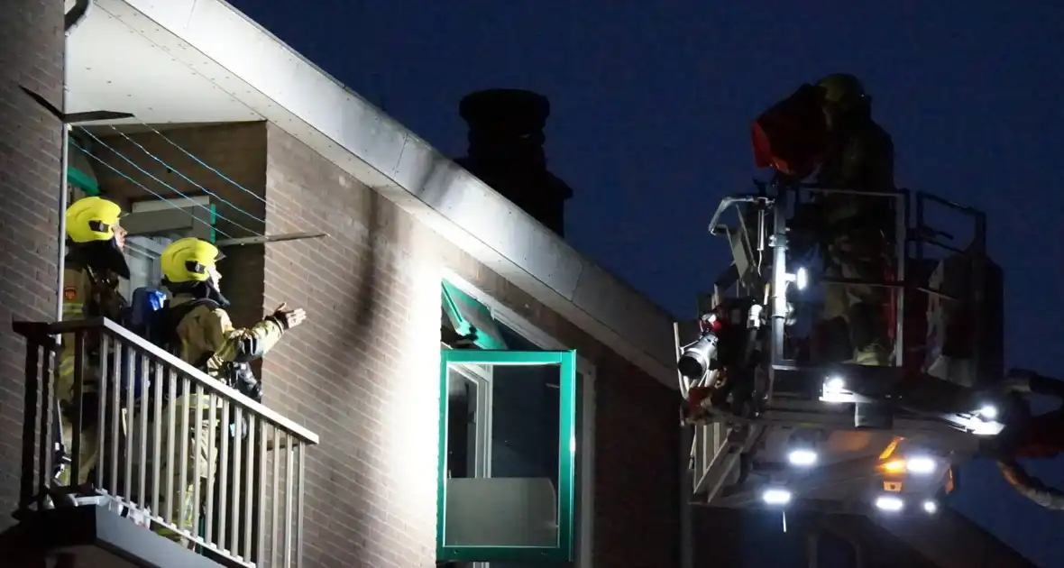 Brandweer ingezet voor brandgeur in portiekflat - Foto 3