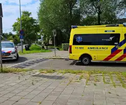 Ongeval letsel fietser botst tegen PostNL busje