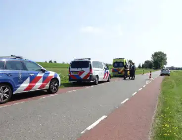 Scooterrijder ten val door vliegje in oog