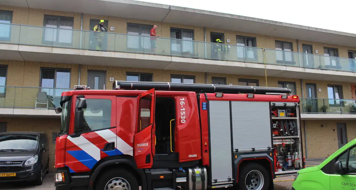 Bewoner gewekt nadat brandweer deur openramt wegens vergeten pannetje - Foto 2