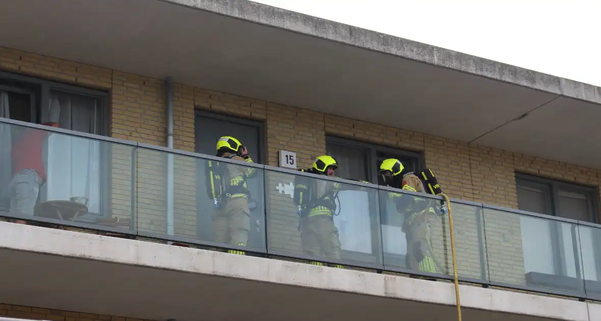 Bewoner gewekt nadat brandweer deur openramt wegens vergeten pannetje - Foto 3