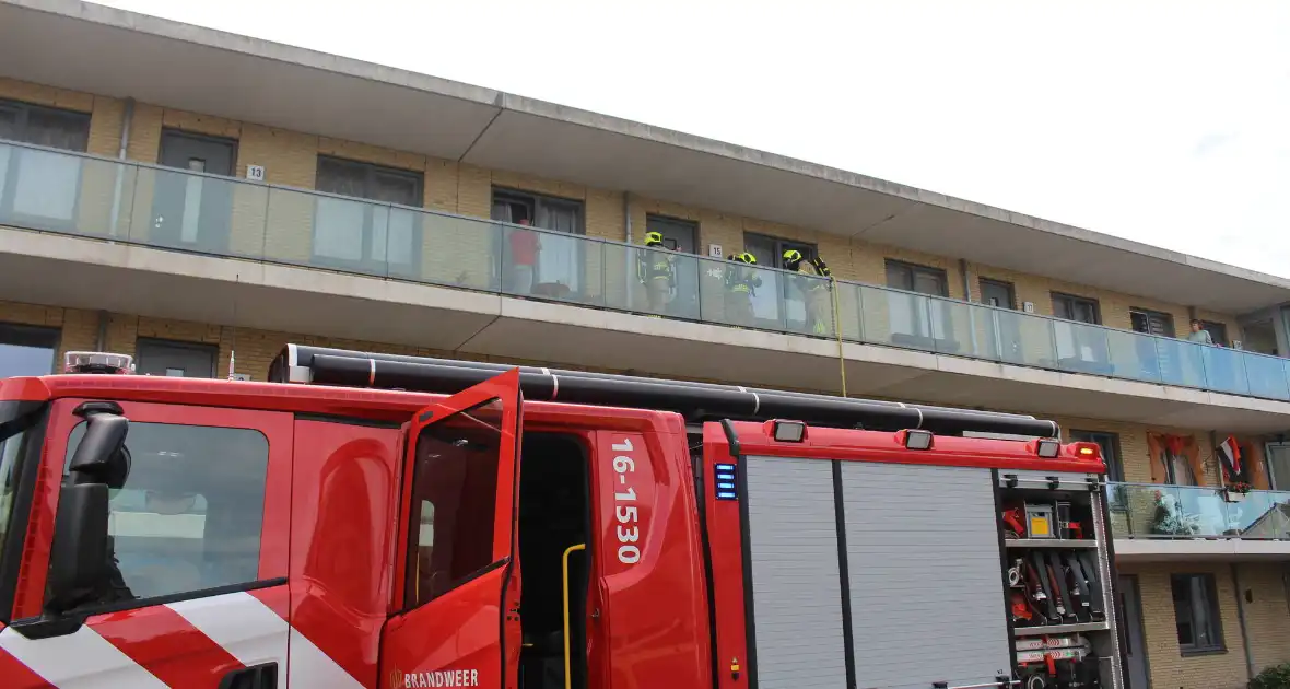 Bewoner gewekt nadat brandweer deur openramt wegens vergeten pannetje - Foto 4